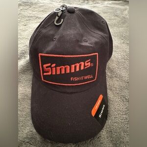 BRAND NEW SIMMS (FISH IT WELL) low crown CAP. Black in color with SIMMS PATCH!